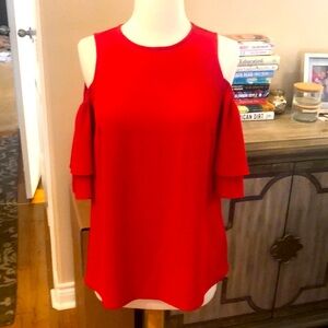 Red Michael Kors cold shoulder top purchased from Michael Kors store